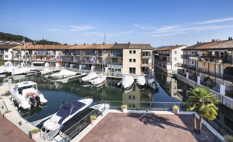 A mooring place for life comes with this waterfront triplex apartment